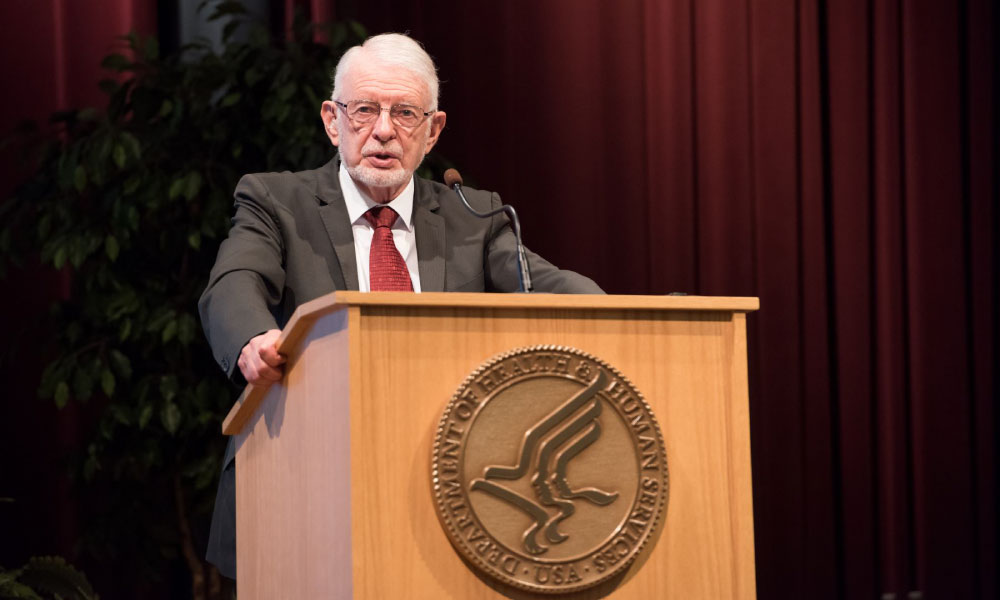 Daniel McFadden speaking at a podium